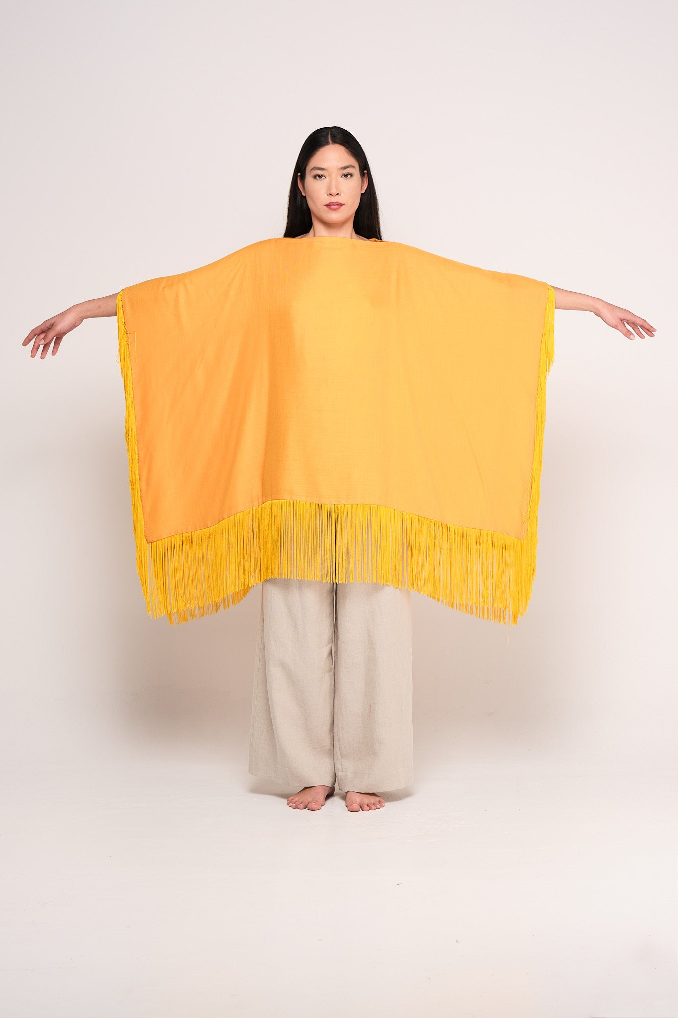 Yellow wool fringed muslin cape