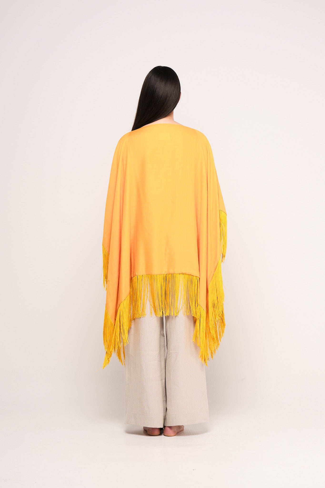 Yellow wool fringed muslin cape